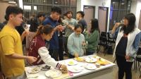 College students enjoying different kinds of wine and cheese during the Wine and Cheese Tasting Workshop on 19 March 2019